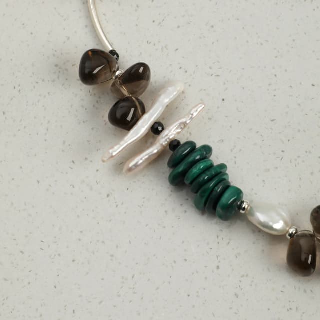 Forest Malachite: Detail of the malachite, smoky quartz and baroque pearl.